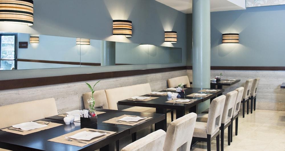 Palacio de Aviles Affiliated By Melia Exterior foto Restaurant interior