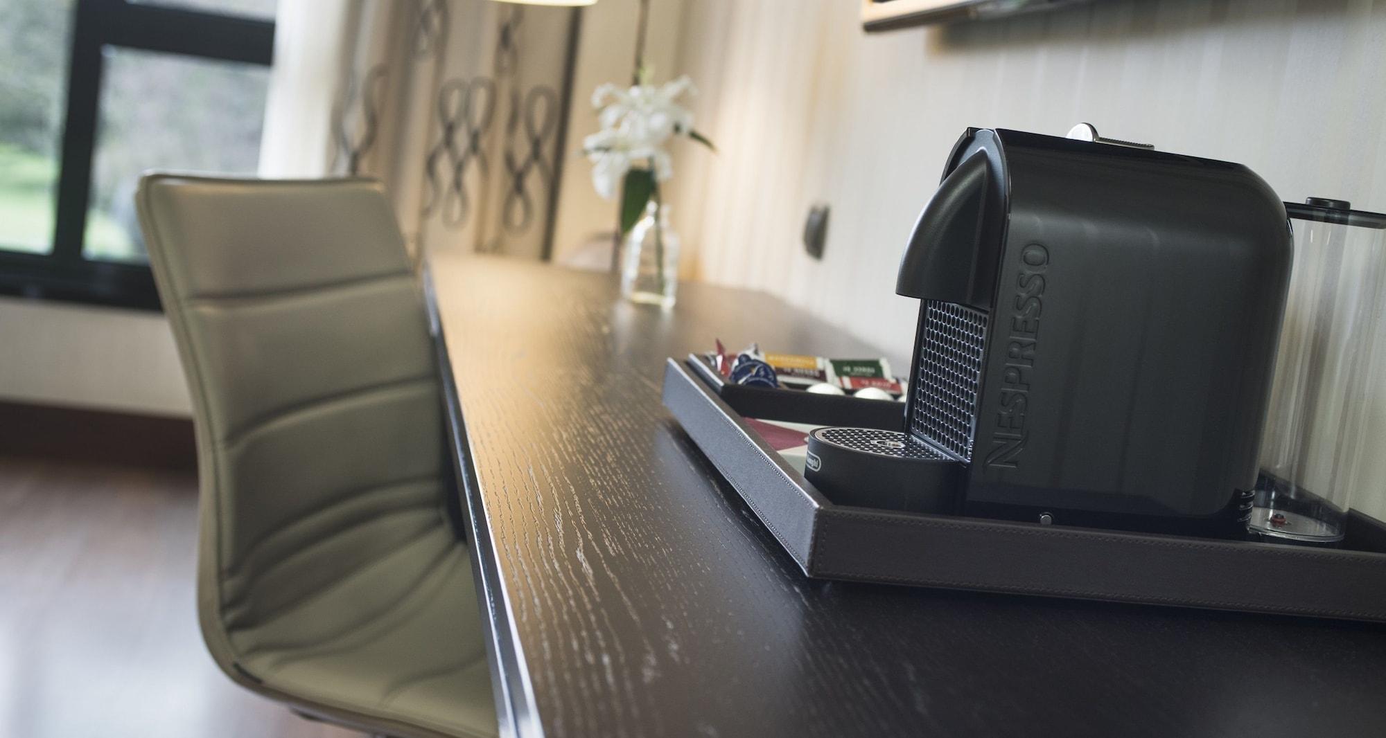 Palacio de Aviles Affiliated By Melia Exterior foto A Nespresso machine in a hotel