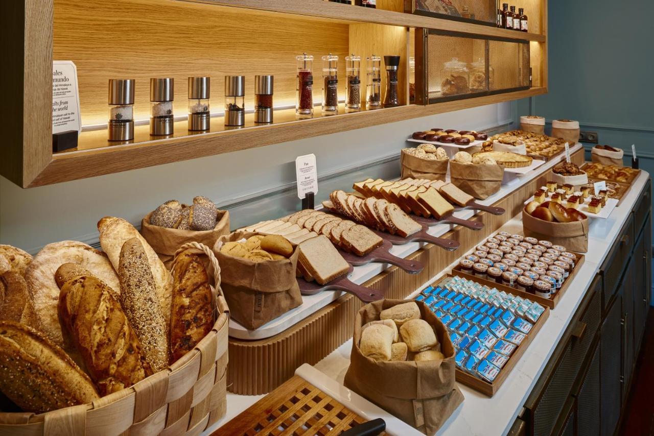 Palacio de Aviles Affiliated By Melia Exterior foto Bread and pastry at a buffet