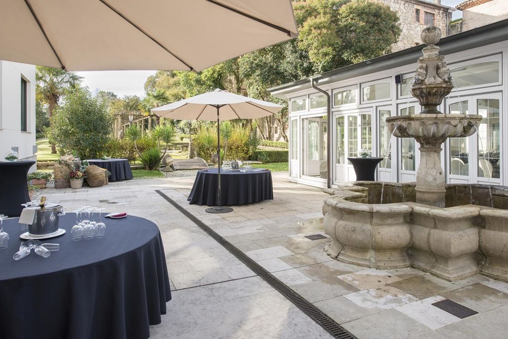 Palacio de Aviles Affiliated By Melia Exterior foto The hotel's garden